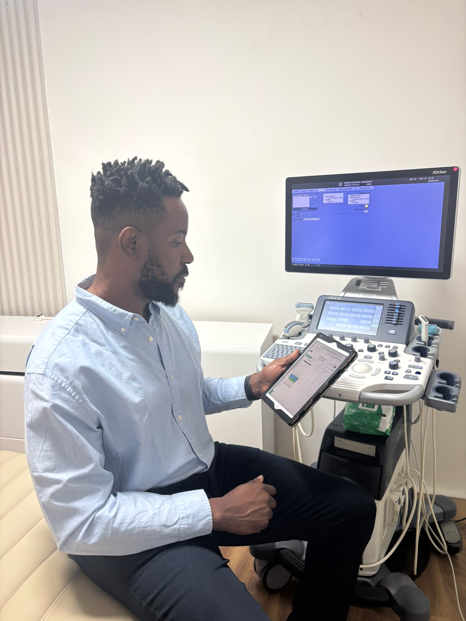 Clinician preparing ultrasound equipment at Dr Skin Central Diagnostics in Ipswich